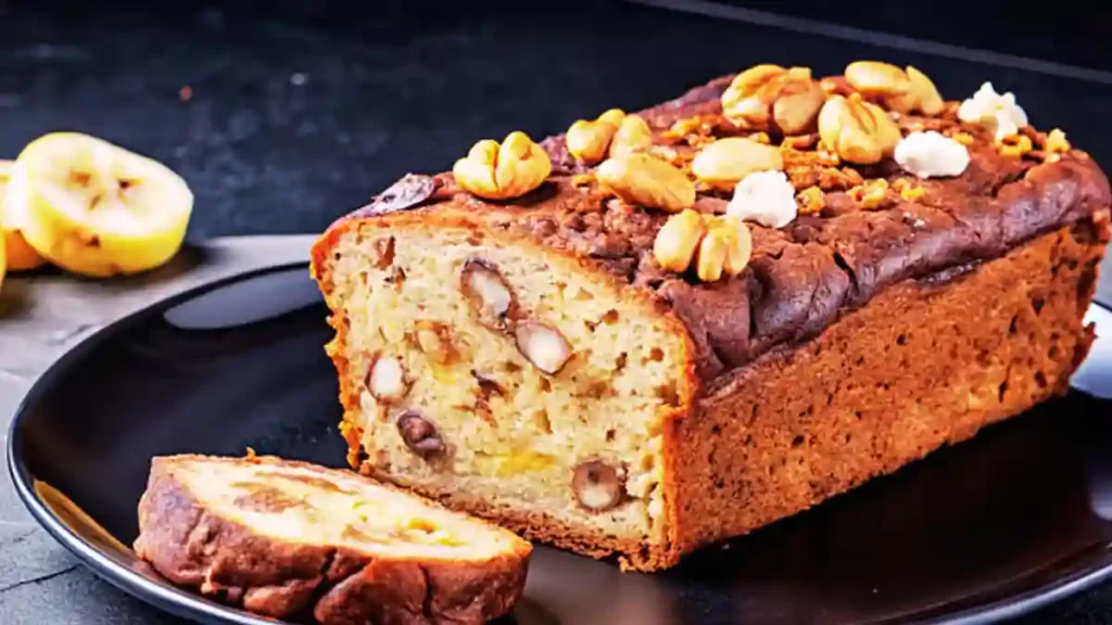 Almond Raisin Cake Recipe ঘরেই বানান নরম ও সুস্বাদু আমন্ড–কিসমিস কেক 4 Almond Raisin Cake Recipe প্রস্তুত প্রণালী